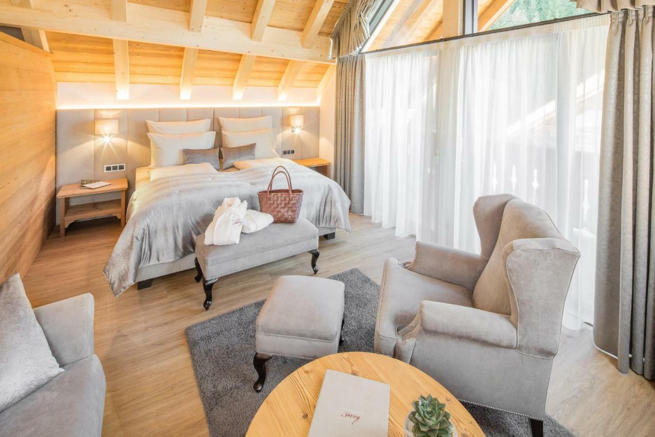 Savoy Dolomites Luxury & Spa Hotel เซลวาดีวัลการ์เดนา ภายนอก รูปภาพ